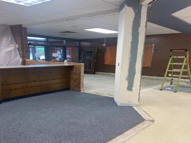 Demolition of wall for new entry into secure office