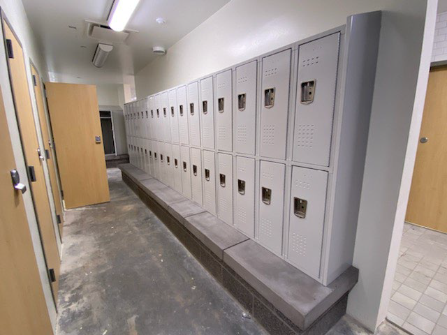 Lockers being installed in locker room