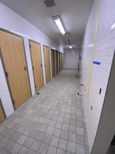 Tile work progressing in locker room