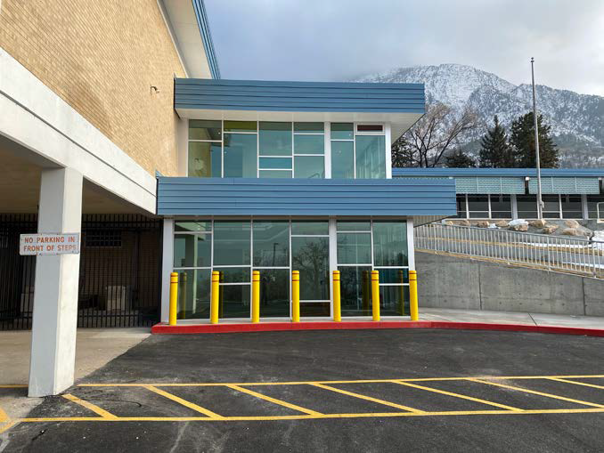 New addition creates secure entry vestibule and improves ADA accessibility.