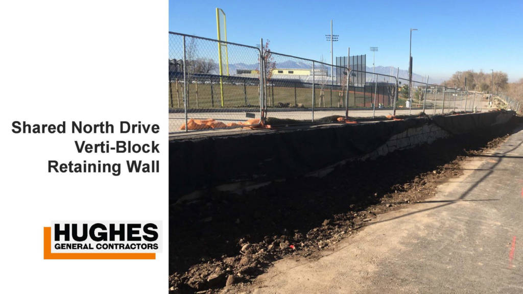 Shared north drive verti-block retaining wall \ Hughes General Contractors