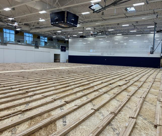 Floor being prepped in gym