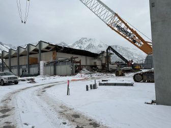 Demolition of gymnasium from auditorium