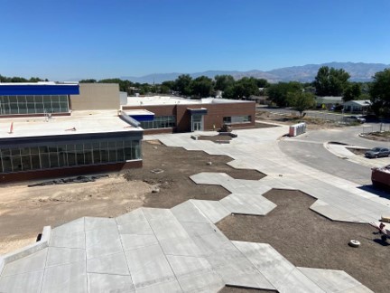 Preparation of planting areas on east and north of the building