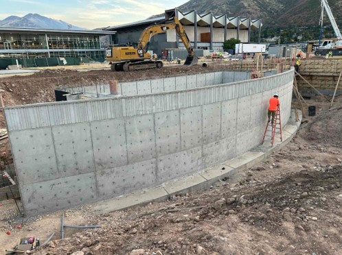 Orchestra pit foundation poured and preparing for backfill
